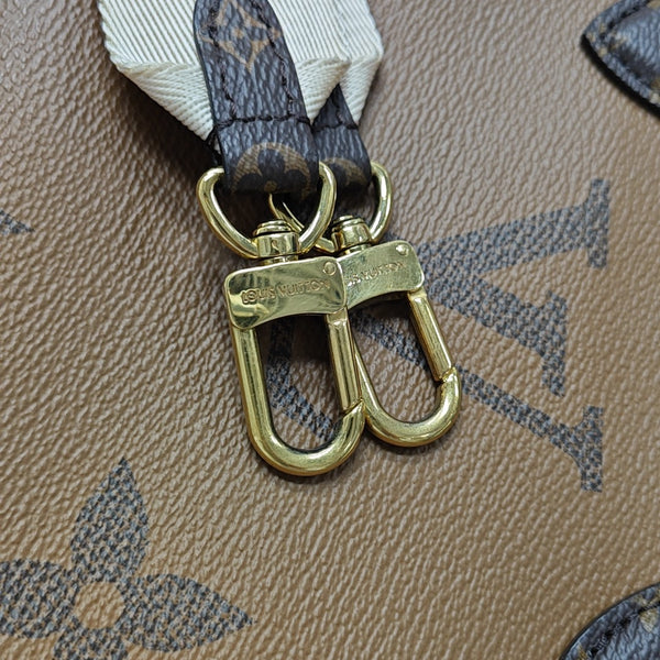 ONTHEGO PM Monogram Coated Canvas Brown