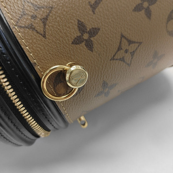 CANNES PM Monogram Coated Canvas Brown