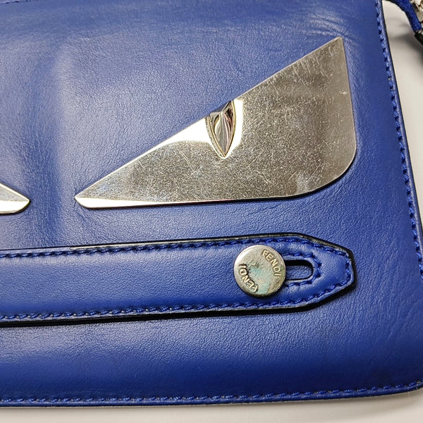 Authenticated pre-owned Monster Calfskin Blue - Clutch at Looply