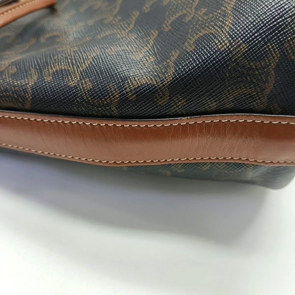 Authenticated pre-owned TRIOMPHE CANVAS Small Coated Canvas Brown - Bucket Bag at Looply