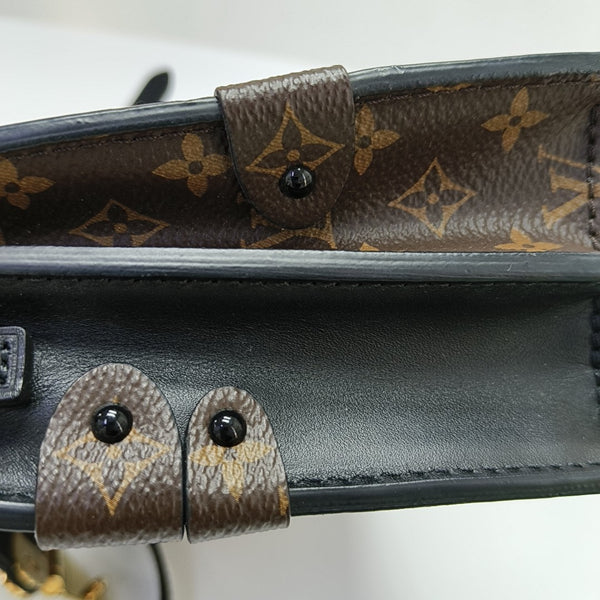 TRUNK Monogram Coated Canvas Brown