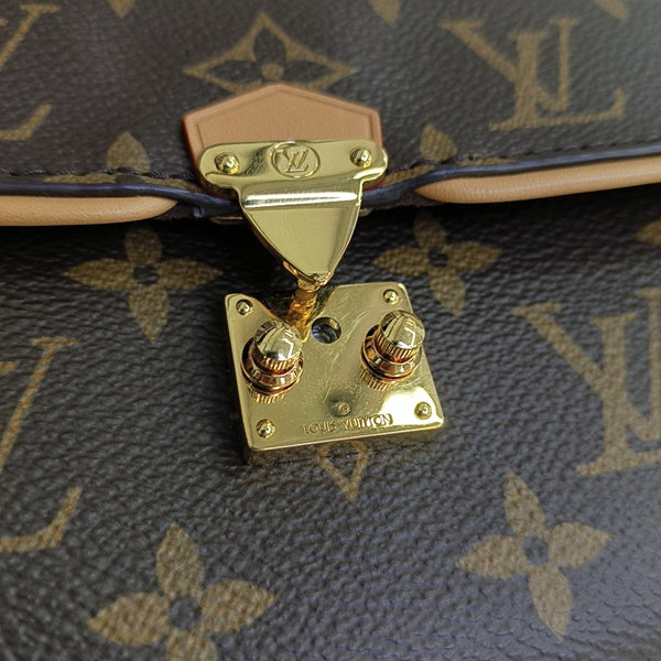Pochette Camille Monogram Coated Canvas Brown