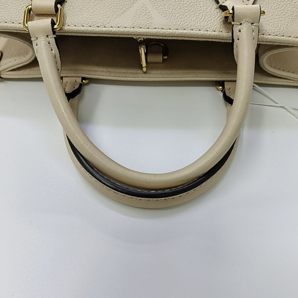 ONTHEGO PM Monogram Calfskin Beige