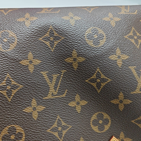 SPEEDY 25 Monogram Coated Canvas Brown