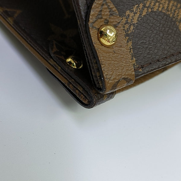 ONTHEGO MM Monogram Coated Canvas Brown