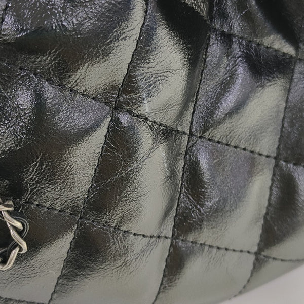 CHANEL 25 Small Quilted Waxed Cafskin Black
