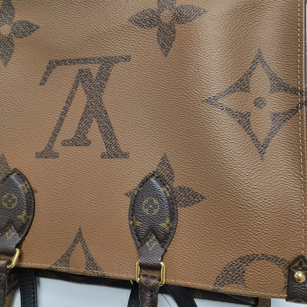 ONTHEGO MM Monogram Coated Canvas Brown