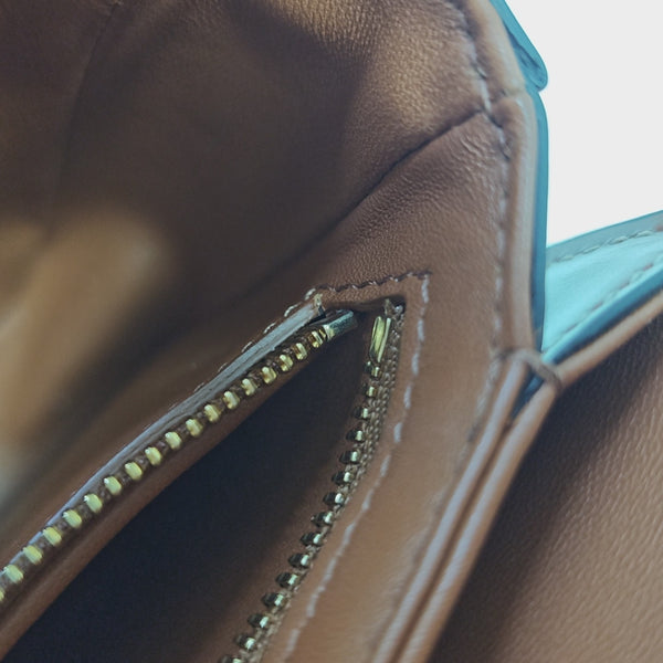 TRIOMPHE Small Coated Canvas Brown