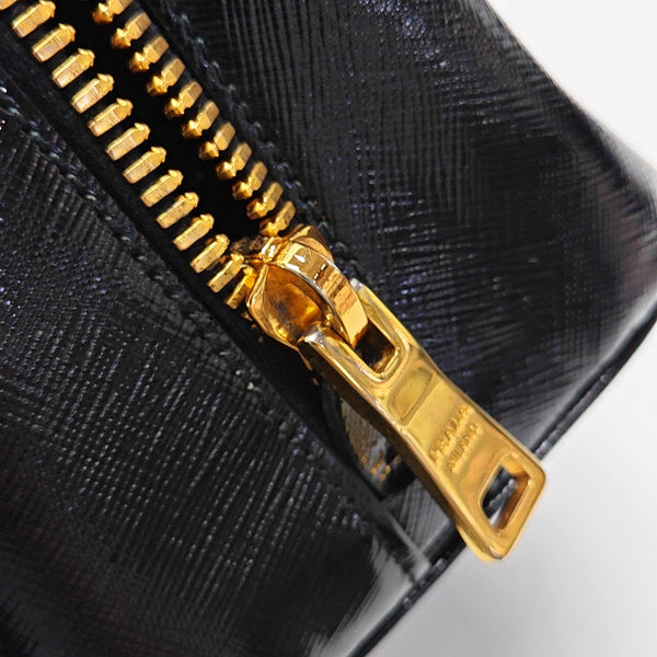 Authenticated pre-owned Promenade Saffiano Calfskin Black - Top Handle Bag at Looply