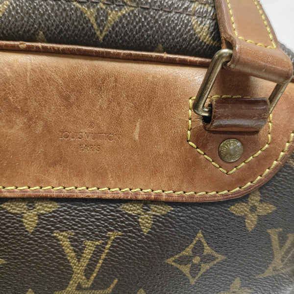 EXCURSION Monogram Coated Canvas Brown