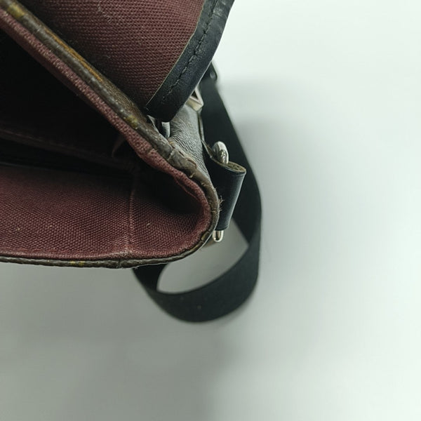 BASS Monogram Coated Canvas Brown