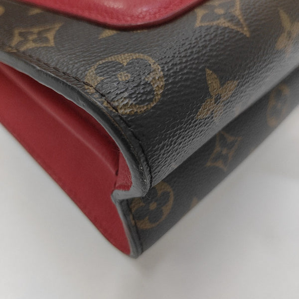 VICTOIRE Monogram Coated Canvas Brown