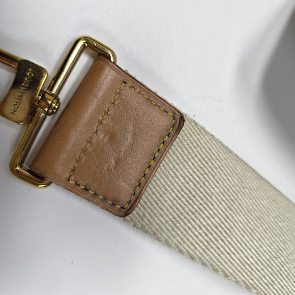 UTILITY Monogram Coated Canvas Brown