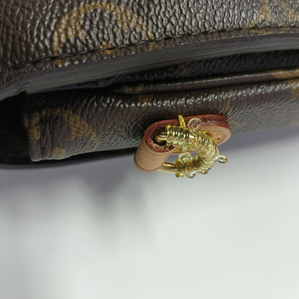 MÉTIS MM Monogram Coated Canvas Brown