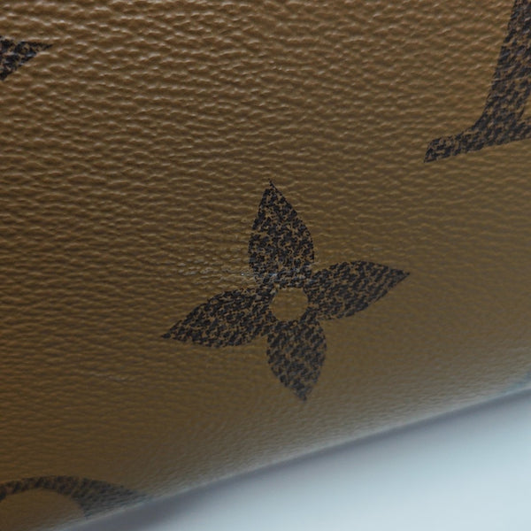ONTHEGO PM Monogram Coated Canvas Brown