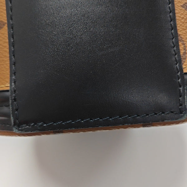 CANNES PM Monogram Coated Canvas Brown