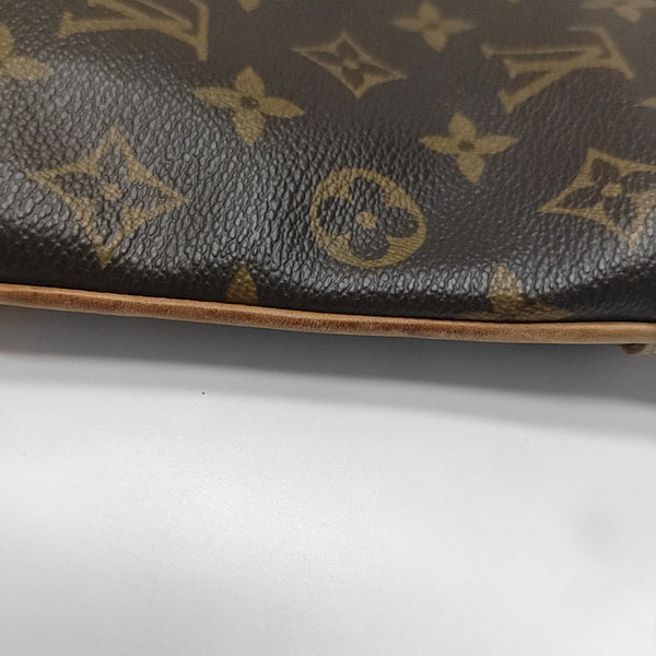 COUSSIN GM Monogram Coated Canvas Brown