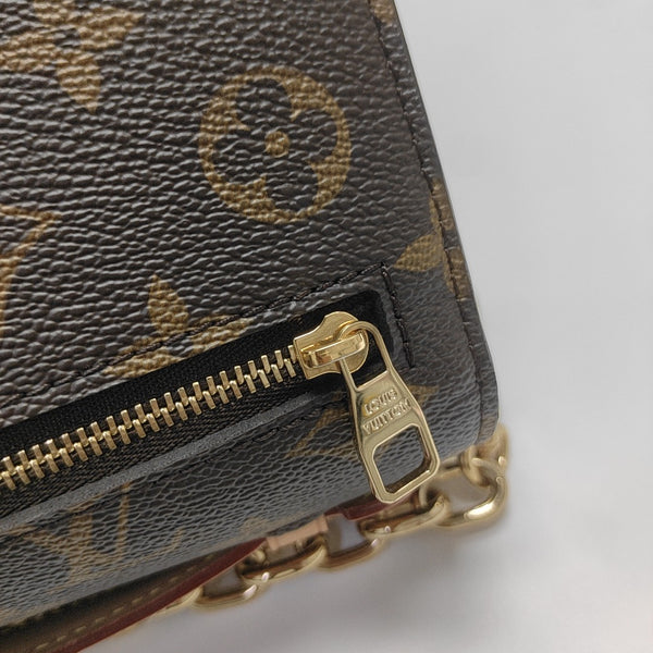 MÉTIS EAST WEST Monogram Coated Canvas Brown