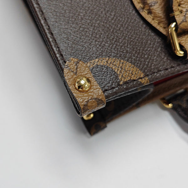 ONTHEGO PM Monogram Coated Canvas Brown