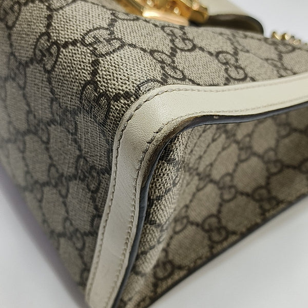 Padlock Small Monogram Coated Canvas Beige