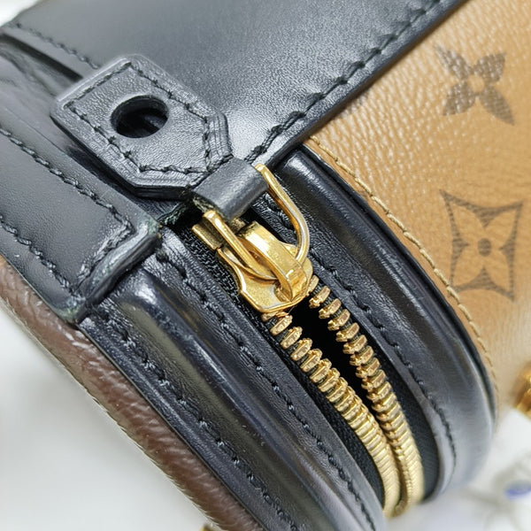 CANNES PM Monogram Coated Canvas Brown