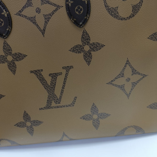 ONTHEGO GM Monogram Coated Canvas Brown