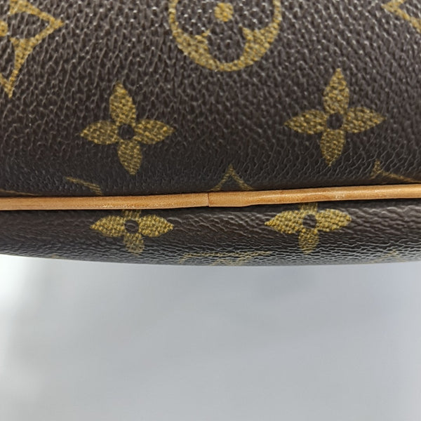 EXCURSION Monogram Coated Canvas Brown