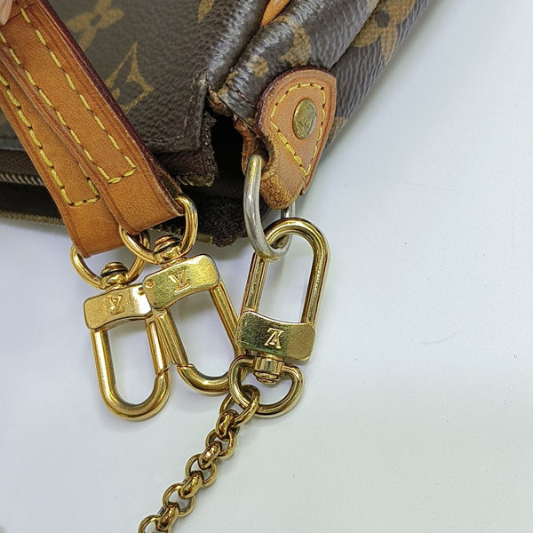 EVA Monogram Coated Canvas Brown