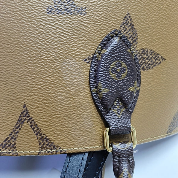 ONTHEGO MM Monogram Coated Canvas Brown