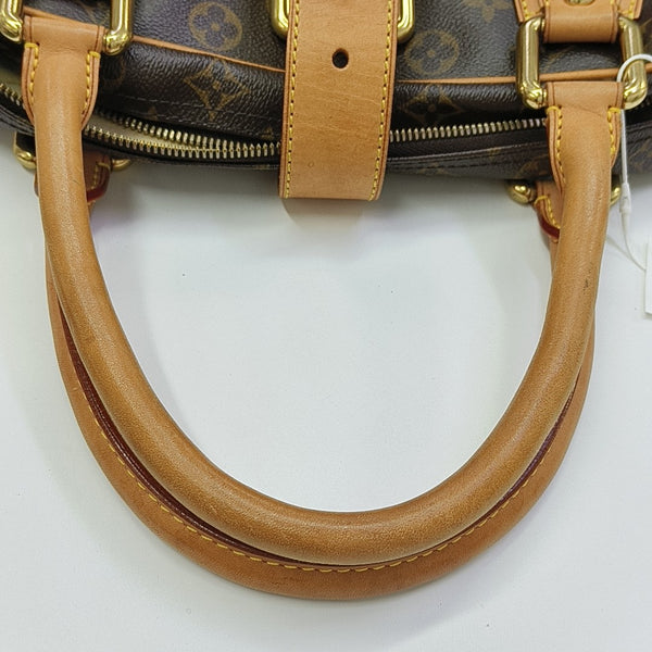 MANHATTAN GM Monogram Coated Canvas Brown