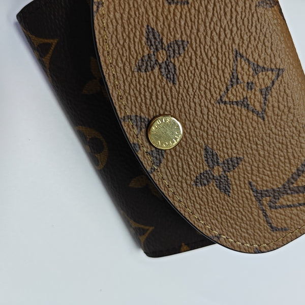 Monogram Coated Canvas Wallet Brown