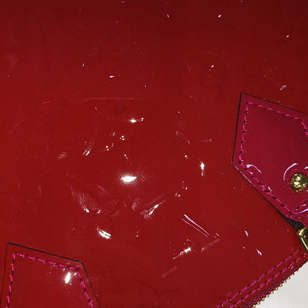 Authenticated pre-owned ALMA BB Monogram Patent Leather Red - Shoulder Bag at Looply