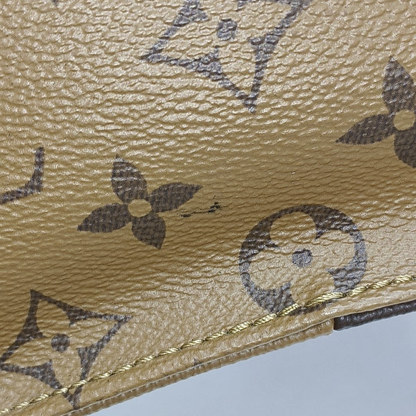 ONTHEGO MM Monogram Coated Canvas Brown