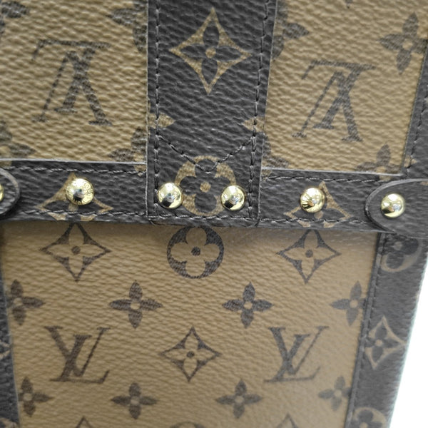TRUNK Monogram Coated Canvas Brown