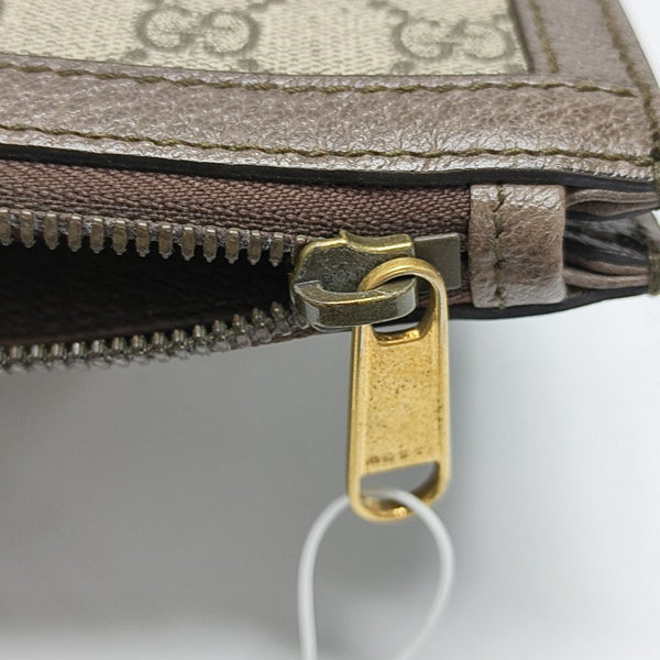 Authenticated pre-owned Ophidia Monogram Coated Canvas Beige - Clutch at Looply