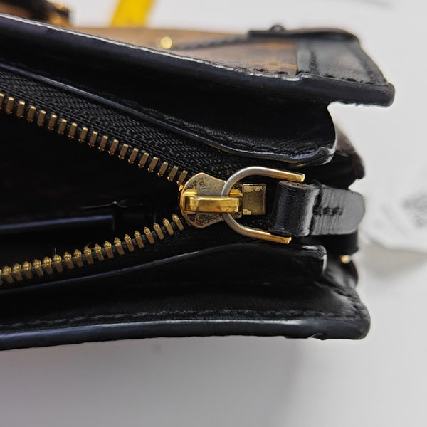 TRUNK Monogram Coated Canvas Brown
