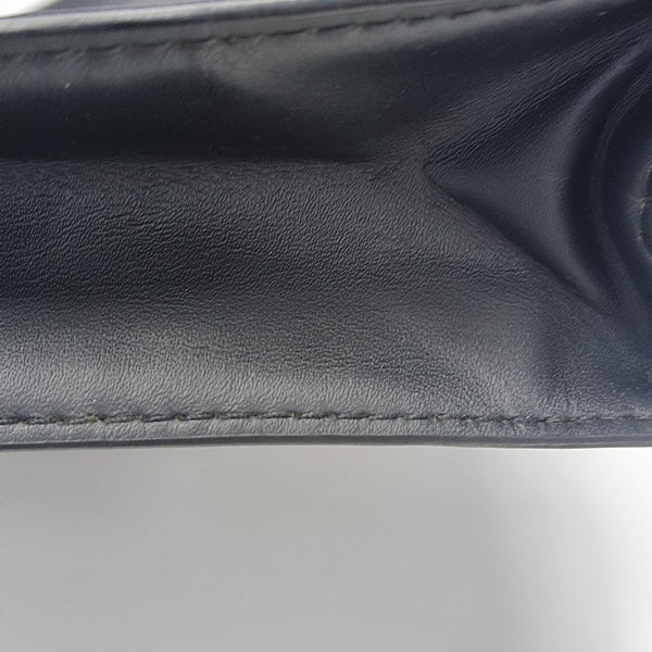Pochette Voyag MM Monogram Coated Canvas Black