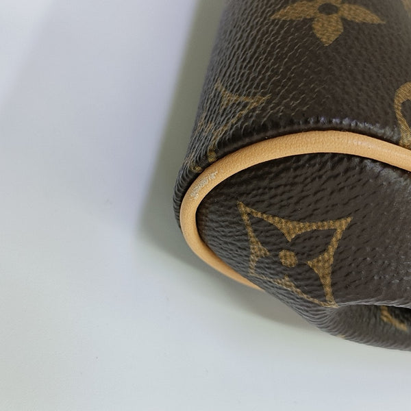 Pochette Eva Monogram Coated Canvas Brown