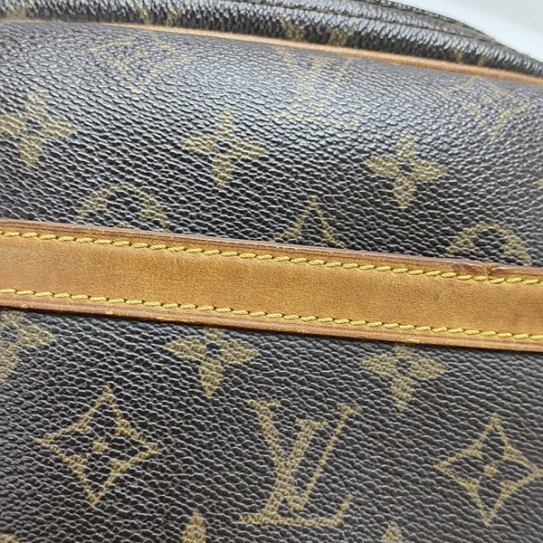 REPORTER Monogram Coated Canvas Brown