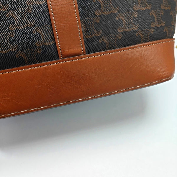 Authenticated pre-owned TRIOMPHE CANVAS Medium Coated Canvas Brown - Bucket Bag at Looply