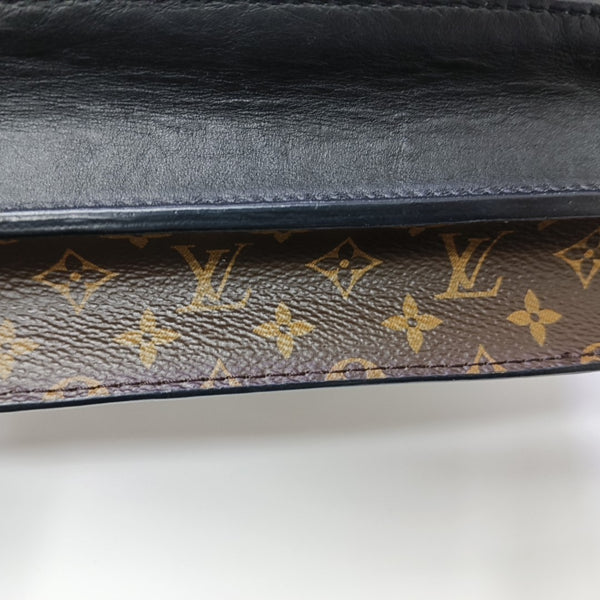 TRUNK Monogram Coated Canvas Brown