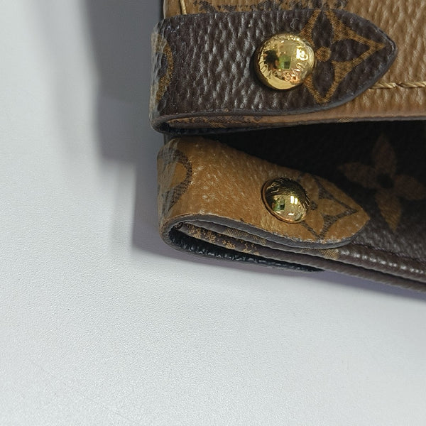 ONTHEGO MM Monogram Coated Canvas Brown