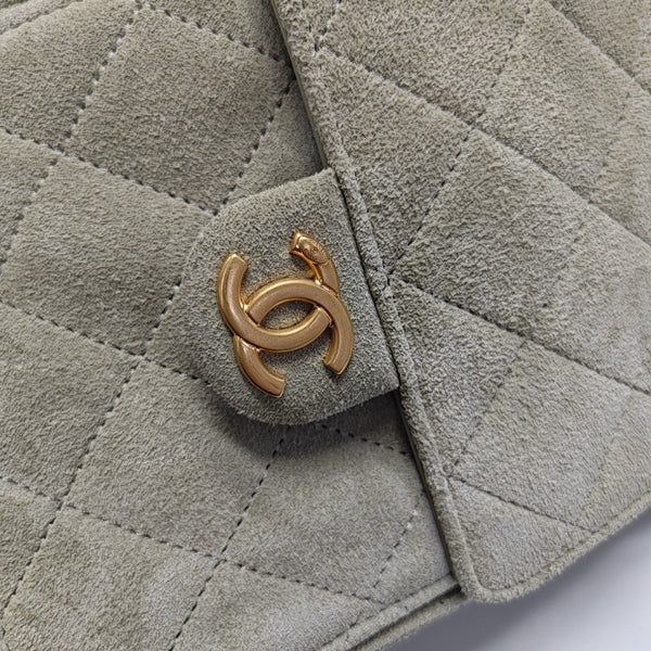 Authenticated pre-owned CHANEL 25 Quilted Suede Green - Shoulder Bag at Looply