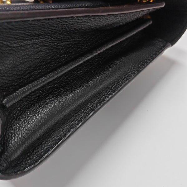 VICTOIRE Monogram Coated Canvas Brown