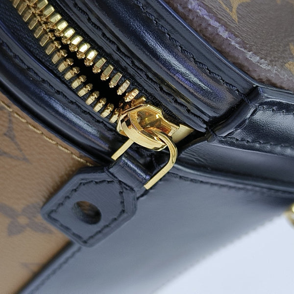 CANNES PM Monogram Coated Canvas Brown