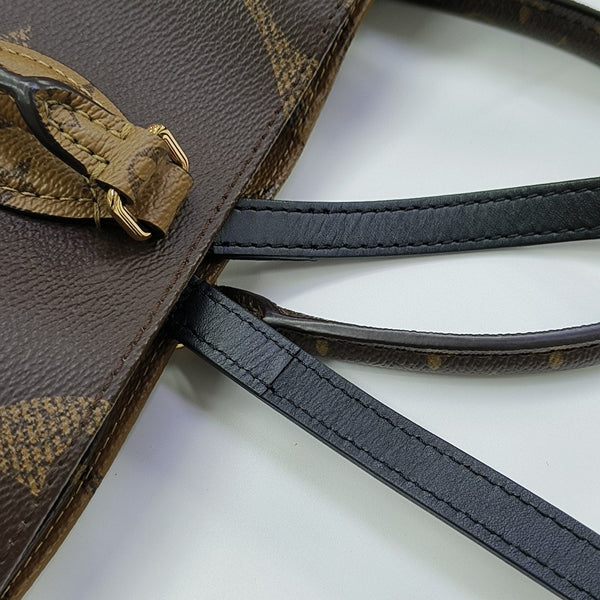 ONTHEGO MM Monogram Coated Canvas Brown