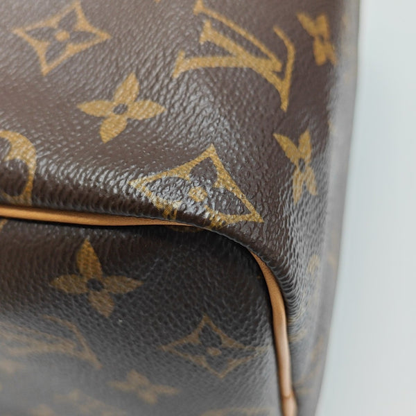 SPEEDY 25 Monogram Coated Canvas Brown
