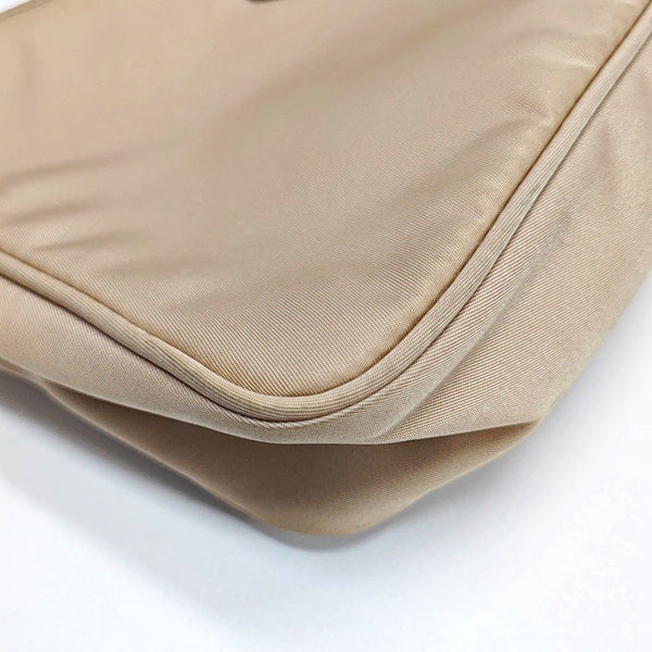Authenticated pre-owned Re-Edition2000 Mini Nylon Beige - Top Handle Bag at Looply