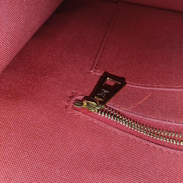 ONTHEGO MM Monogram Coated Canvas Brown