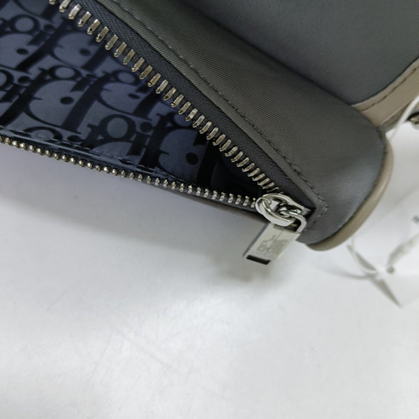 Authenticated pre-owned Saddle Calfskin Gray - Crossbody Bag at Looply